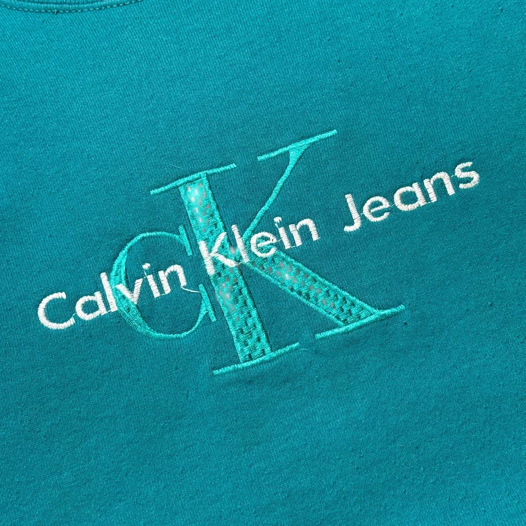 【USED】90s Calvin Klein Jeans Bootleg Sweat Teal Green / カルバンクラインジーンズ ブートレグ センターロゴ 刺繍 クルーネック スウェット ティールグリーン 青緑 90年代 ヴィンテージ 古着