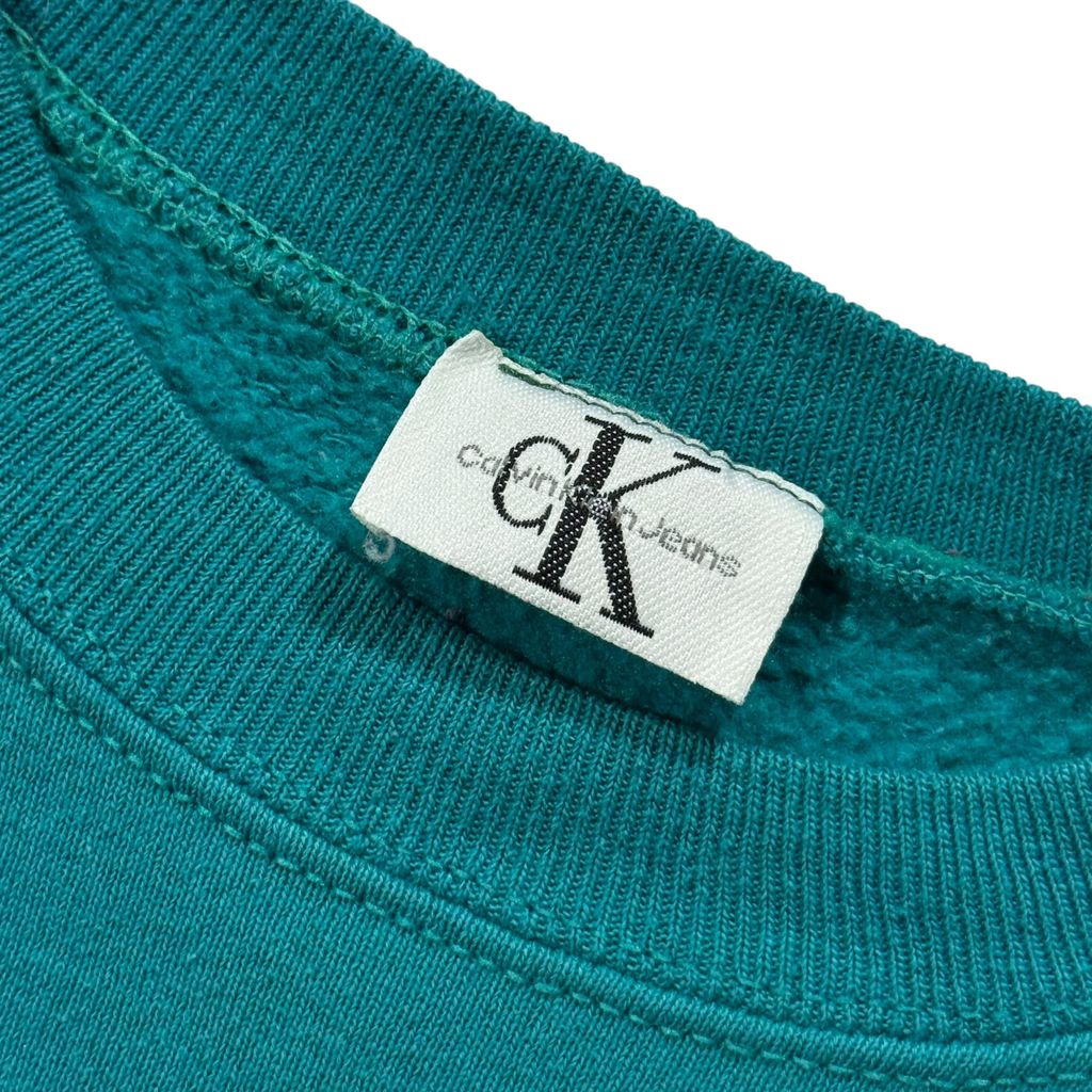 【USED】90s Calvin Klein Jeans Bootleg Sweat Teal Green / カルバンクラインジーンズ ブートレグ センターロゴ 刺繍 クルーネック スウェット ティールグリーン 青緑 90年代 ヴィンテージ 古着