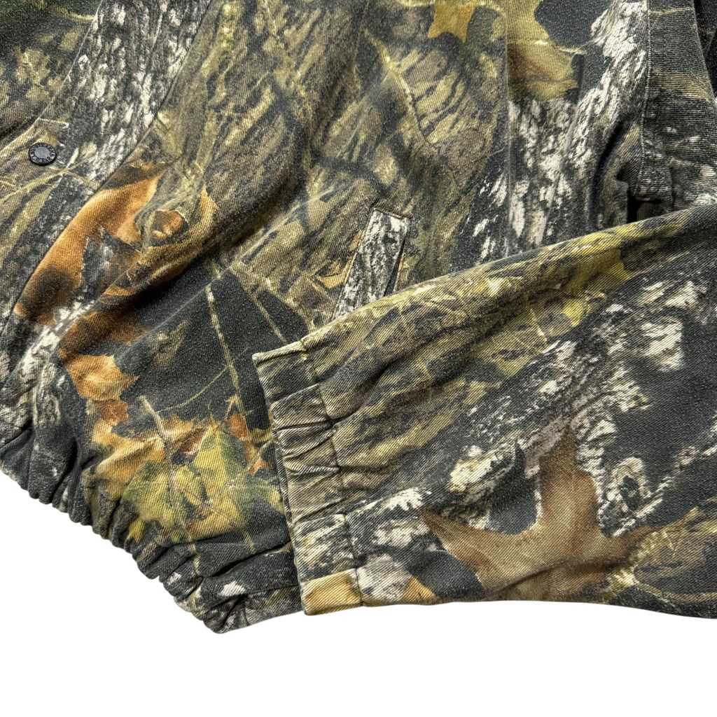 【USED】90s〜00s MAD DOG GEAR by Stearns Real Tree Camo Cotton Jacket XL / マッドドッグギア リアルツリーカモ 迷彩柄 コットンジャケット 総柄 企業刺繍 Scent-Lok 90年代 ヴィンテージ 古着